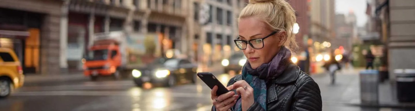 woman looking at her phone