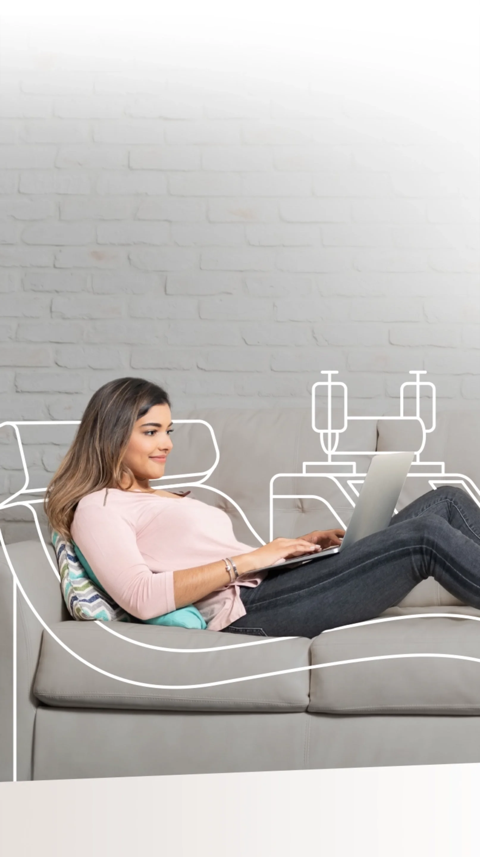 Young woman laying down working from her laptop